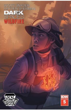 Dark Spaces: Wildfire 5E published by IDW with cover art by Caitlin Yarsky